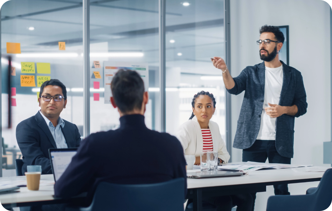 Man explaining accounting errors in meeting